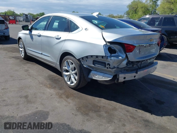 2015 Chevrolet Impala LTZ with VIN 2G1165S34F9101489, listed as a IAAI auction lot 42141525 with 149,037 mi miles and . Bid and sale history available at DreamBid. Image 3.