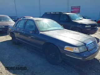 1998 Ford Crown Victoria Police with VIN 2FAFP71WXWX184526, listed as a IAAI auction lot 41563307 with 309,303 mi miles. Bid and sale history available at carsss.com. Image 6.