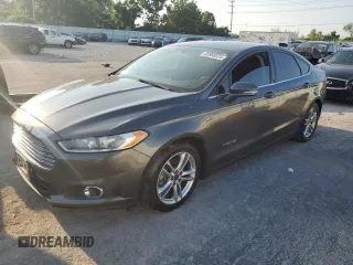 2016 Ford Fusion SE Hybrid with VIN 3FA6P0LU3GR304735, listed as a Copart auction lot 80664304 with 208,026 mi miles and Salvage title. Bid and sale history available at DreamBid. Image 1.