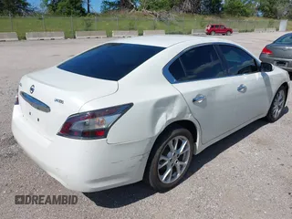 2014 Nissan Maxima S with VIN 1N4AA5AP6EC447048, listed as a IAAI auction lot 42625937 with 144,856 mi miles and . Bid and sale history available at DreamBid. Image 4.