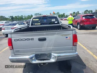 1999 Dodge Dakota SLT z VIN 1B7GL22X9XS258964, wystawiony jako IAAI lot #42309862 z przebiegiem 177 561 mil mil oraz . Historia ofert i sprzedaży dostępna na DreamBid. Obrazek 16.