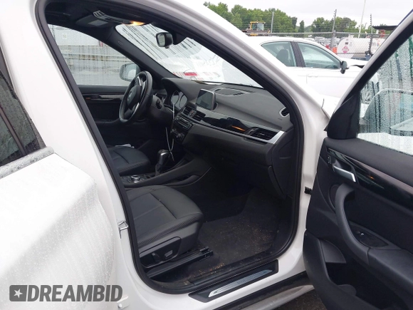 2019 BMW X1 xDrive28i with VIN WBXHT3C54K3H35641, listed as a IAAI auction lot 42241894 with 100,989 mi miles and . Bid and sale history available at DreamBid. Image 5.