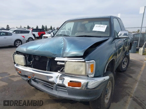 1996 Toyota T100 SR5 z VIN JT4UN24D7T0029477, wystawiony jako IAAI lot #41484412 z przebiegiem 260 843 mil mil oraz . Historia ofert i sprzedaży dostępna na DreamBid. Obrazek 2.