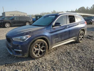 2017 BMW X1 sDrive28i with VIN WBXHU7C39H5H35490, listed as a Copart auction lot 75499974 with 0 mi miles and Salvage Title. Bid and sale history available at carsss.com. Image 1.