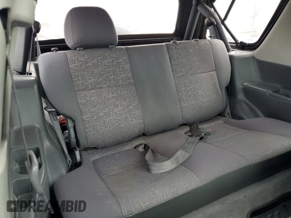 2002 Isuzu Rodeo with VIN 4S2CM57W024315499, listed as a Copart auction lot 75885194 with 183,425 mi miles and Salvage title. Bid and sale history available at DreamBid. Image 11.