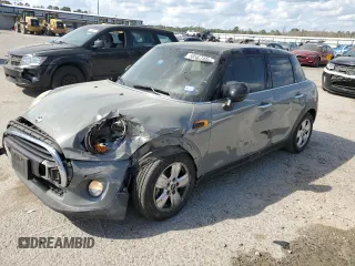 2016 MINI Hardtop 4 Door with VIN WMWXU1C55G2D09641, listed as a Copart auction lot 50567495 with 123,796 mi miles and Salvage Title. Bid and sale history available at DreamBid. Image 1.