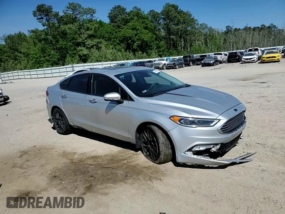 2017 Ford Fusion SE z VIN 3FA6P0HD7HR184691, wystawiony jako Copart lot #52515085 z przebiegiem 113 275 mil mil oraz Szkoda całkowita • Salvage title. Historia ofert i sprzedaży dostępna na DreamBid. Obrazek 11.