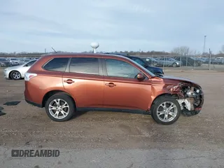2014 Mitsubishi Outlander SE z VIN JA4AZ3A31EZ008884, wystawiony jako IAAI lot #41825440 z przebiegiem 171 232 mil mil oraz . Historia ofert i sprzedaży dostępna na DreamBid. Obrazek 13.