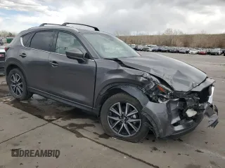 2017 Mazda CX-5 Grand Touring with VIN JM3KFBDL4H0163339, listed as a Copart auction lot 50566495 with 83,453 mi miles and Salvage Title. Bid and sale history available at carsss.com. Image 4.