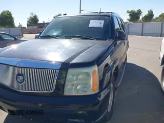 2004 Cadillac Escalade z VIN 1GYEC63T94R235191, wystawiony jako IAAI lot #42314704 z przebiegiem 164 935 mil mil oraz . Historia ofert i sprzedaży dostępna na DreamBid. Obrazek 6.