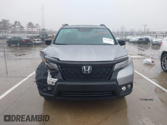 2021 Honda Passport Touring z VIN 5FNYF8H9XMB019732, wystawiony jako IAAI lot #41459208 z przebiegiem 41 745 mil mil oraz . Historia ofert i sprzedaży dostępna na DreamBid. Obrazek 12.