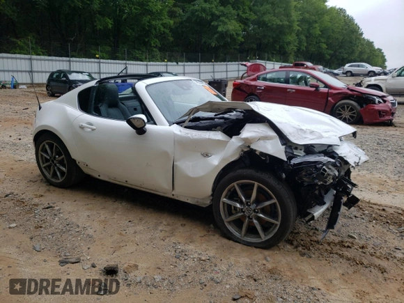 2023 Mazda MX-5 Miata Grand Touring with VIN JM1NDAM73P0551704, listed as a Copart auction lot 58500695 with Not provided miles and Salvage title. Bid and sale history available at DreamBid. Image 4.