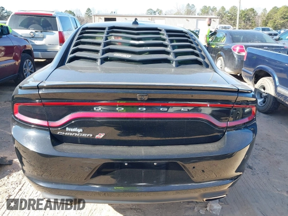 2019 Dodge Charger SXT with VIN 2C3CDXJG4KH710673, listed as a IAAI auction lot 41469797 with 102,011 mi miles and . Bid and sale history available at DreamBid. Image 17.