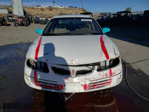 2000 Pontiac Bonneville SE z VIN 1G2HX54K2Y4241848, wystawiony jako Copart lot #80999434 z przebiegiem Nie podano mil oraz Szkoda całkowita • Salvage title. Historia ofert i sprzedaży dostępna na DreamBid. Obrazek 5.