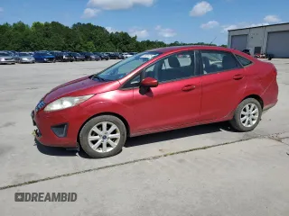 2011 Ford Fiesta SE with VIN 3FADP4BJ3BM209734, listed as a Copart auction lot 57521475 with 191,380 mi miles and Salvage title. Bid and sale history available at DreamBid. Image 1.
