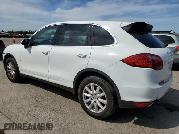 2013 Porsche Cayenne with VIN WP1AA2A2XDLA04038, listed as a Copart auction lot 52906175 with 162,411 mi miles and Salvage title. Bid and sale history available at DreamBid. Image 2.