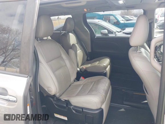2015 Toyota Sienna XLE with VIN 5TDYK3DC2FS640204, listed as a IAAI auction lot 41772349 with 104,156 mi miles. Bid and sale history available at carsss.com. Image 8.