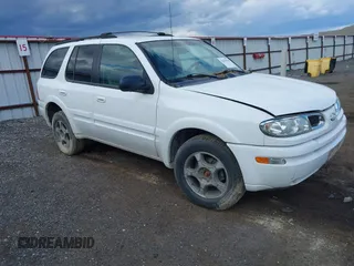 2003 Oldsmobile Bravada z VIN 1GHDT13SX32348743, wystawiony jako IAAI lot #42281014 z przebiegiem 213 536 mil mil oraz . Historia ofert i sprzedaży dostępna na DreamBid. Obrazek 1.