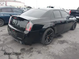2013 Chrysler 300 SRT-8 with VIN 2C3CCAFJ9DH576184, listed as a IAAI auction lot 42162364 with 104,021 mi miles and . Bid and sale history available at carsss.com. Image 4.
