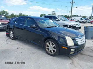 2007 Cadillac STS z VIN 1G6DW677070153268, wystawiony jako IAAI lot #41972600 z przebiegiem 236 176 mil mil oraz . Historia ofert i sprzedaży dostępna na DreamBid. Obrazek 1.