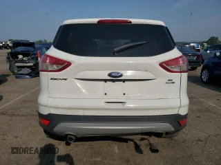 2014 Ford Escape SE z VIN 1FMCU9GX5EUC60849, wystawiony jako Copart lot #60498575 z przebiegiem Nie podano mil oraz Szkoda całkowita • Salvage title. Historia ofert i sprzedaży dostępna na DreamBid. Obrazek 6.