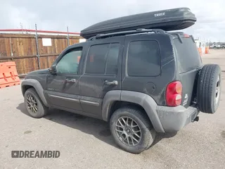 2002 Jeep Liberty Sport with VIN 1J4GL48K02W313000, listed as a IAAI auction lot 41837671 with 168,362 mi miles. Bid and sale history available at carsss.com. Image 3.