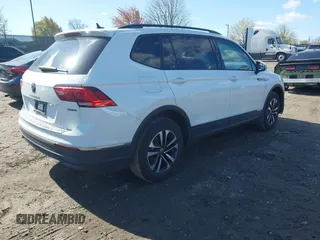 2024 Volkswagen Tiguan S with VIN 3VVFB7AX7RM063715, listed as a IAAI auction lot 41974650 with 23,374 mi miles and . Bid and sale history available at DreamBid. Image 4.