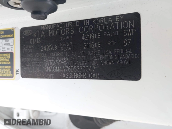 2013 Kia Optima LX with VIN KNAGM4A76D5379047, listed as a IAAI auction lot 41973373 with 135,454 mi miles. Bid and sale history available at carsss.com. Image 9.