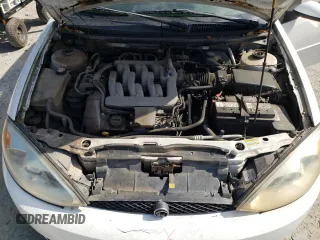 2002 Mercury Cougar z VIN 1ZWFT61L425621799, wystawiony jako Copart lot #54654305 z przebiegiem 159 209 mil mil oraz Szkoda całkowita • Salvage title. Historia ofert i sprzedaży dostępna na DreamBid. Obrazek 11.