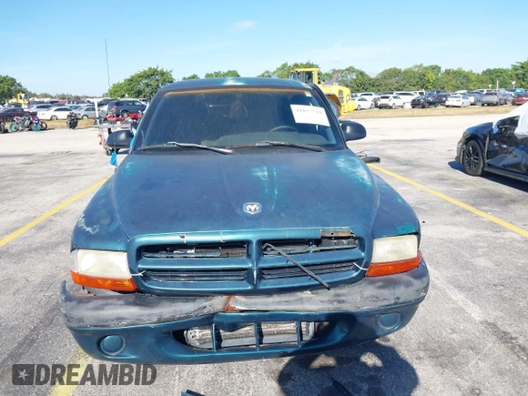 1998 Dodge Dakota SLT with VIN 1B7FL26X2WS685844, listed as a IAAI auction lot 41857719 with Not Provided miles and . Bid and sale history available at carsss.com. Image 12.