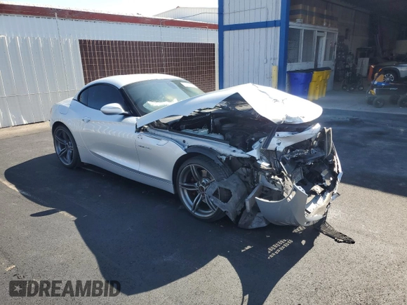 2011 BMW Z4 sDrive35is with VIN WBALM1C54BE633439, listed as a Copart auction lot 60327265 with 112,302 mi miles and Salvage title. Bid and sale history available at DreamBid. Image 4.