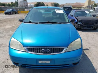 2007 Ford Focus S z VIN 1FAHP34N77W333895, wystawiony jako IAAI lot #42444411 z przebiegiem 155 522 mil mil oraz . Historia ofert i sprzedaży dostępna na DreamBid. Obrazek 6.