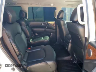 2019 Nissan Armada SL z VIN JN8AY2ND4K9085996, wystawiony jako Copart lot #51916125 z przebiegiem 125 050 mil mil oraz Szkoda całkowita • Salvage title. Historia ofert i sprzedaży dostępna na DreamBid. Obrazek 11.