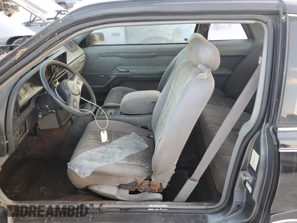 1988 Ford Thunderbird with VIN 1FABP60F9JH246775, listed as a Copart auction lot 77428264 with Not Provided miles and Salvage Title. Bid and sale history available at DreamBid. Image 7.