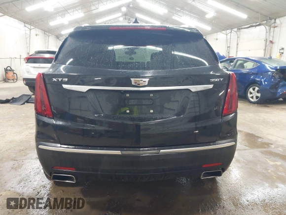 2022 Cadillac XT5 FWD Luxury with VIN 1GYKNAR47NZ100356, listed as a IAAI auction lot 42393314 with 91,492 mi miles and . Bid and sale history available at DreamBid. Image 16.