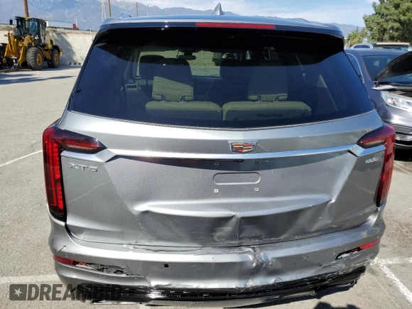 2023 Cadillac XT6 FWD Premium Luxury z VIN 1GYKPCRS5PZ212337, wystawiony jako Copart lot #46283655 z przebiegiem 15 660 mil mil oraz Szkody całkowita. Historia ofert i sprzedaży dostępna na DreamBid. Obrazek 6.