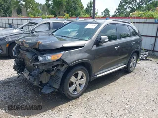 2012 Kia Sorento EX with VIN 5XYKU4A69CG276943, listed as a IAAI auction lot 42604286 with 182,425 mi miles and . Bid and sale history available at DreamBid. Image 2.