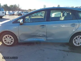 2014 Toyota Prius v Two with VIN JTDZN3EU2EJ006518, listed as a IAAI auction lot 41224398 with 90,907 mi miles. Bid and sale history available at carsss.com. Image 6.