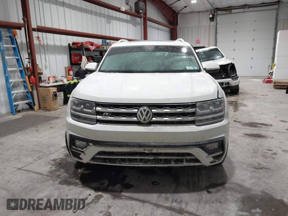 2019 Volkswagen Atlas SE z VIN 1V2XR2CA0KC595596, wystawiony jako IAAI lot #41410019 z przebiegiem 103 336 mil mil oraz . Historia ofert i sprzedaży dostępna na DreamBid. Obrazek 13.
