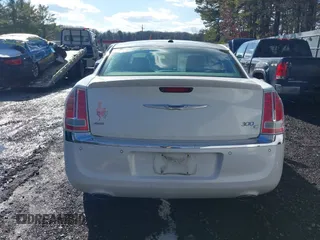 2013 Chrysler 300 with VIN 2C3CCAKGXDH733148, listed as a IAAI auction lot 41541442 with 216,074 mi miles. Bid and sale history available at carsss.com. Image 16.