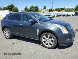 2014 Cadillac SRX Performance Collection z VIN 3GYFNCE36ES687267, wystawiony jako Copart lot #58242255 z przebiegiem 167 577 mil mil oraz Szkoda całkowita • Salvage title. Historia ofert i sprzedaży dostępna na DreamBid. Obrazek 4.