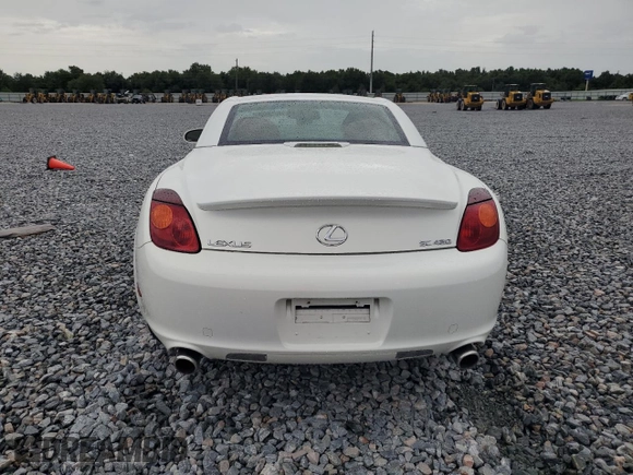 2003 Lexus SC 430 with VIN JTHFN48Y030045309, listed as a Copart auction lot 59034585 with 104,167 mi miles and Salvage title. Bid and sale history available at DreamBid. Image 6.