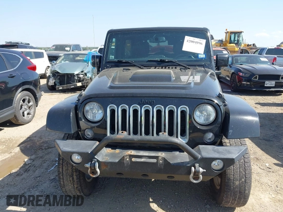 2015 Jeep Wrangler Unlimited Sahara with VIN 1C4BJWEG0FL717536, listed as a IAAI auction lot 42004096 with 90,802 mi miles and . Bid and sale history available at DreamBid. Image 12.