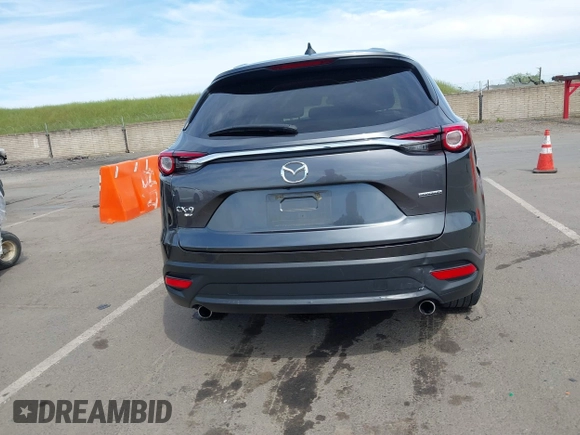 2021 Mazda CX-9 Sport with VIN JM3TCBBY7M0520437, listed as a IAAI auction lot 42022562 with 77,063 mi miles and . Bid and sale history available at DreamBid. Image 16.