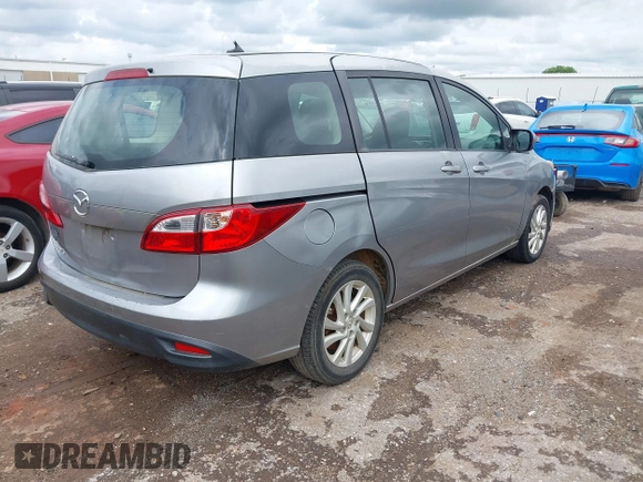 2012 Mazda 5 Sport with VIN JM1CW2BL0C0111151, listed as a IAAI auction lot 42359887 with 158,986 mi miles and . Bid and sale history available at DreamBid. Image 4.