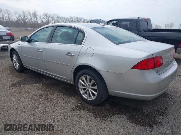 2009 Buick Lucerne CXL with VIN 1G4HD57M79U141033, listed as a IAAI auction lot 42061042 with 161,021 mi miles. Bid and sale history available at carsss.com. Image 3.