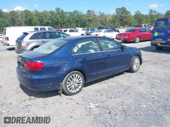 2014 Volkswagen Jetta TDI w/Premium/Nav with VIN 3VWLL7AJ3EM381929, listed as a IAAI auction lot 42539178 with 101,851 mi miles and . Bid and sale history available at DreamBid. Image 4.