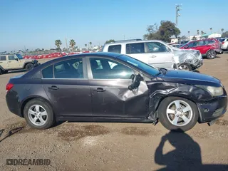 2014 Chevrolet Cruze 1LT with VIN 1G1PC5SB6E7199693, listed as a IAAI auction lot 42004060 with 97,231 mi miles. Bid and sale history available at carsss.com. Image 12.