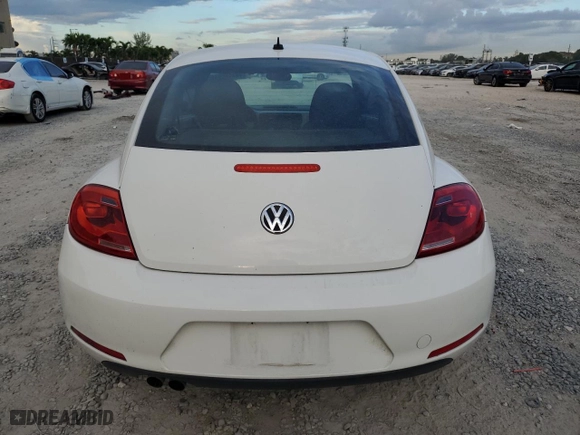 2012 Volkswagen Beetle 2.5L w/Sun PZEV with VIN 3VWJP7ATXCM631497, listed as a Copart auction lot 74442964 with 72,097 mi miles and Salvage Title. Bid and sale history available at carsss.com. Image 6.