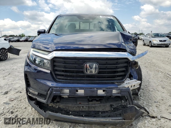 2023 Honda Ridgeline RTL-E with VIN 5FPYK3F74PB037333, listed as a Copart auction lot 56209715 with 36,041 mi miles and Salvage title. Bid and sale history available at DreamBid. Image 5.